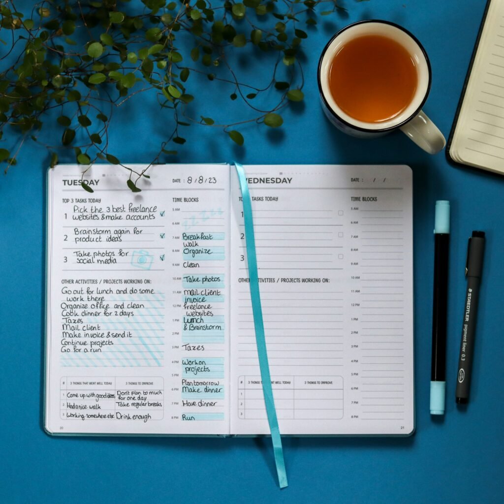 color-coded weekly calendar / planner app on a phone or laptop screen